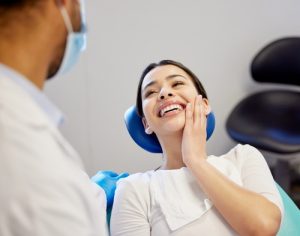 woman smiling at dentist 