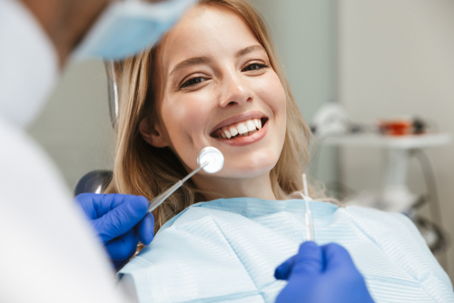 woman smiling in dentist chair