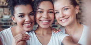 three women smiling