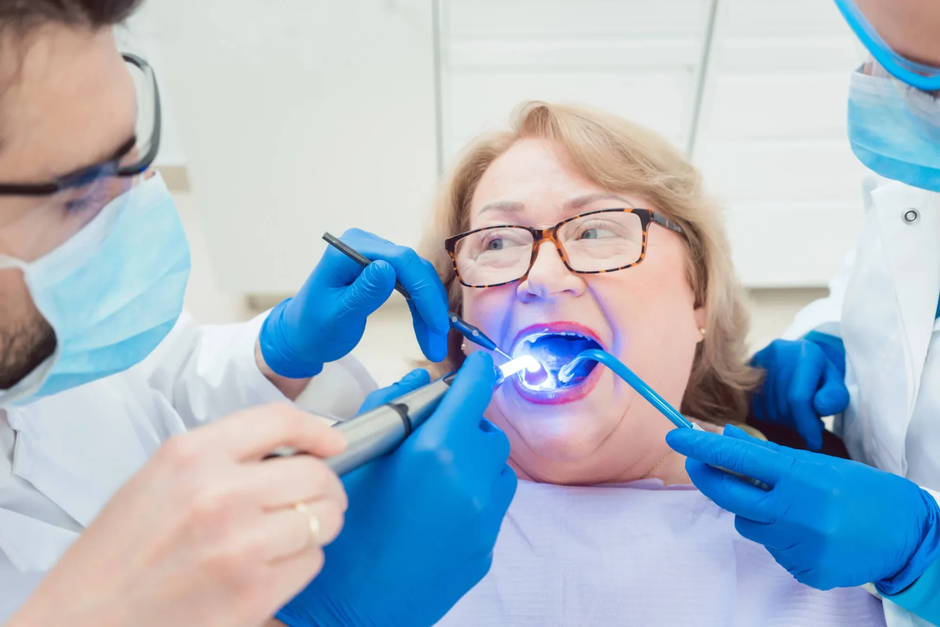 Dentist in Farmington Hills, MI curing dental crowns.